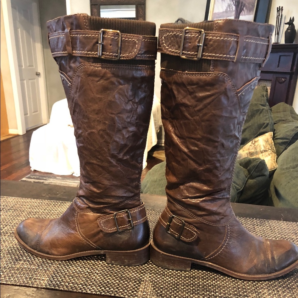 Tall, brown leather boots